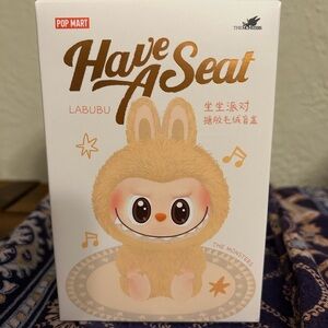 Pop Mart Labubu 'Have A Seat' Figurine (Baba)